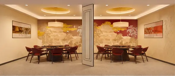 Modern restaurant dining area with divider, Asian landscape mural, tables.